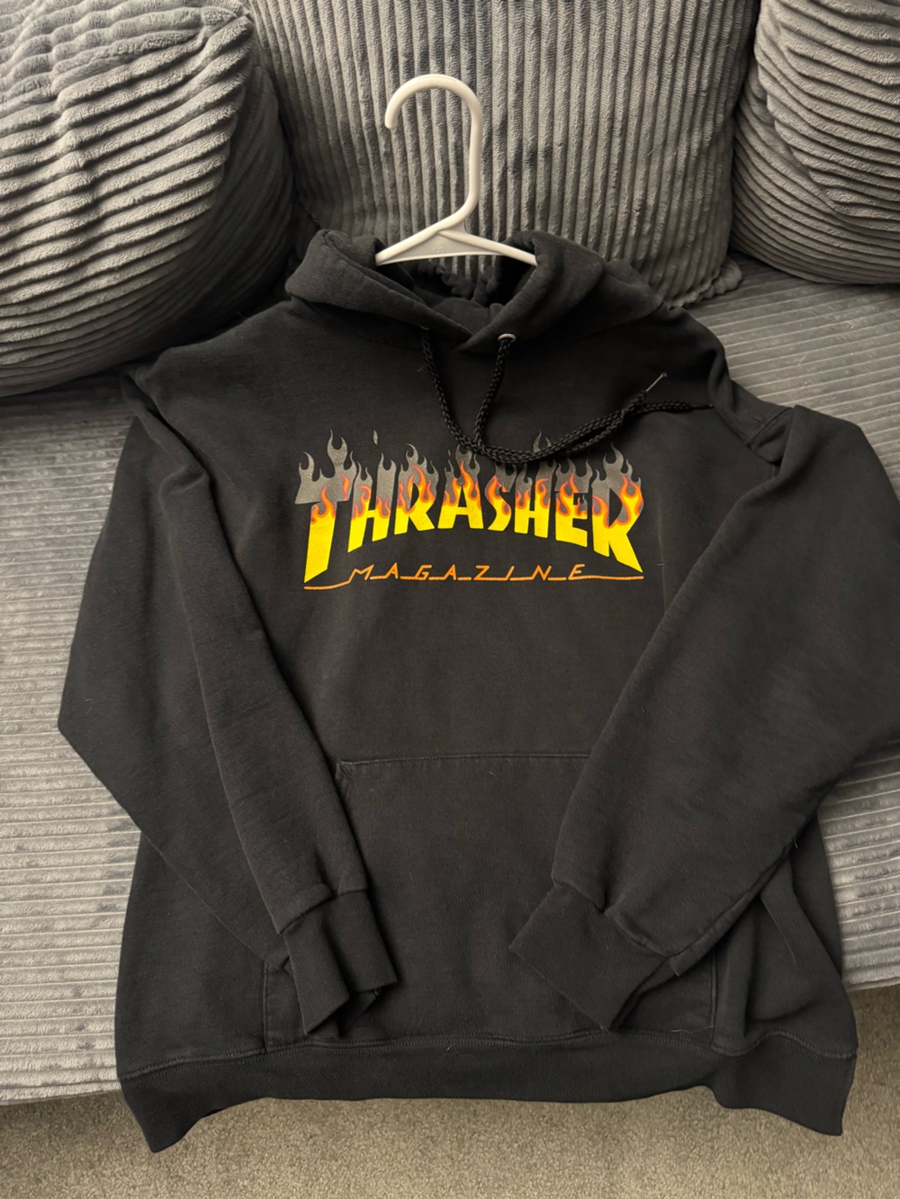 Thrasher Black Hoodie with Yellow-Orange Flame Logo